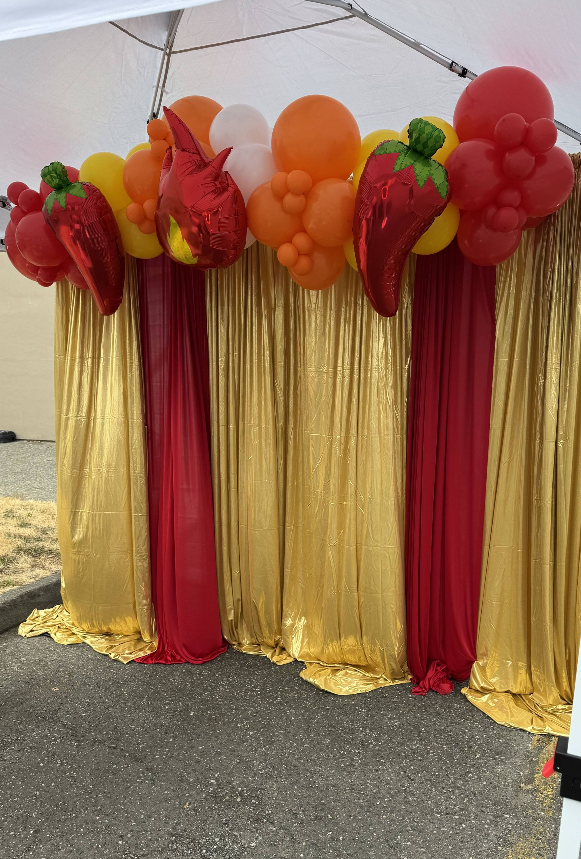 Corporate celebration with red and yellow balloons