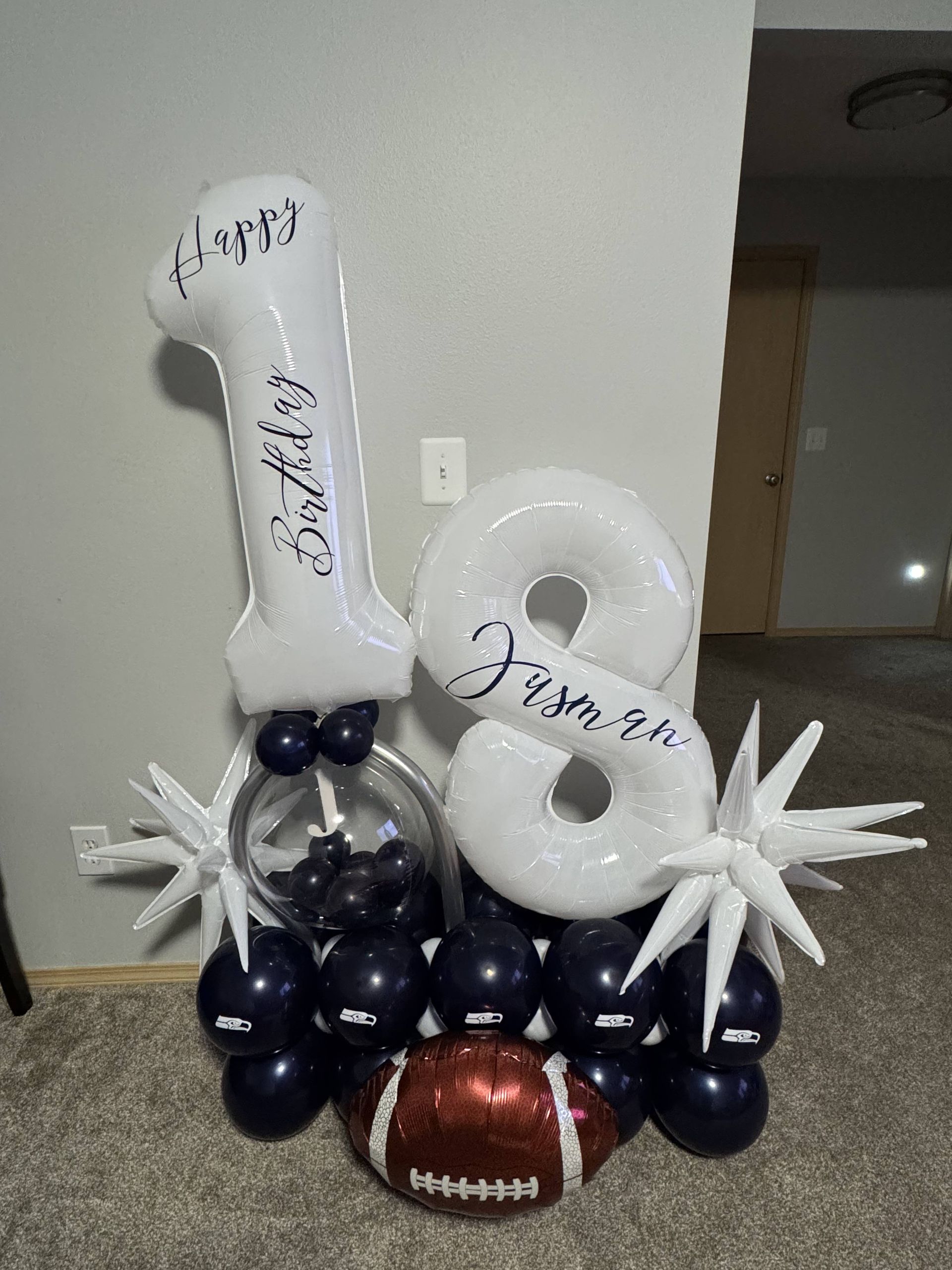 18 year old party with blue and white balloons