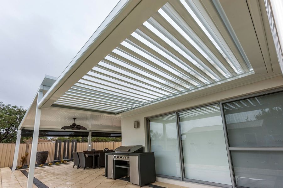 White Louvred Patio Roof Over a Deck — Precision Patios Toowoomba In Toowoomba, QLD