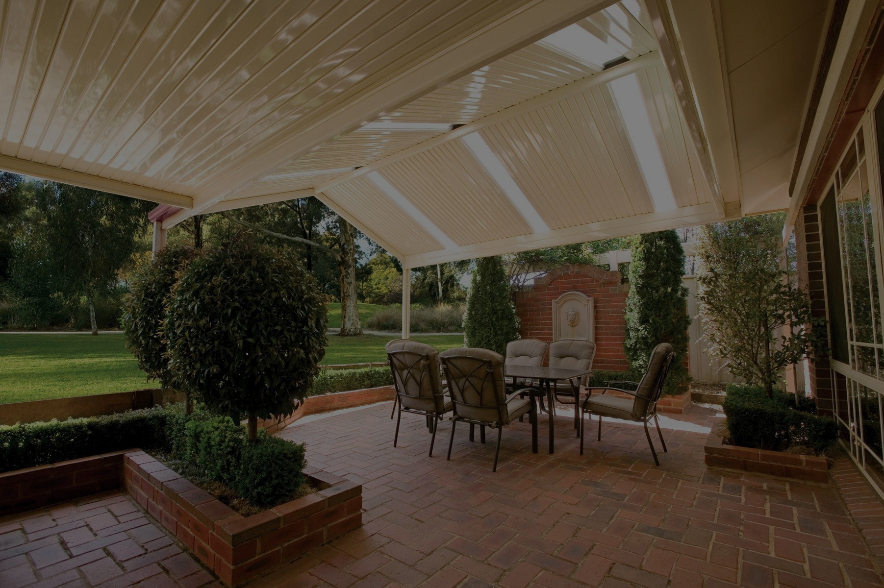 Paved Walkway with Wave Pattern, Bordering a Flower Bed — Precision Patios Toowoomba In Toowoomba, QLD