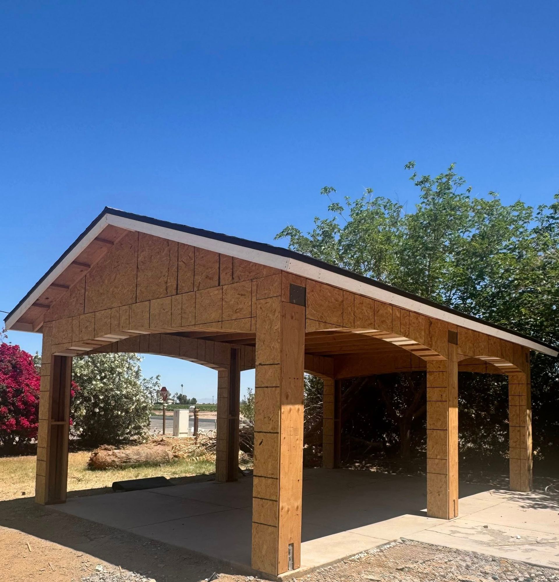 A wooden structure with a blue sky in the background