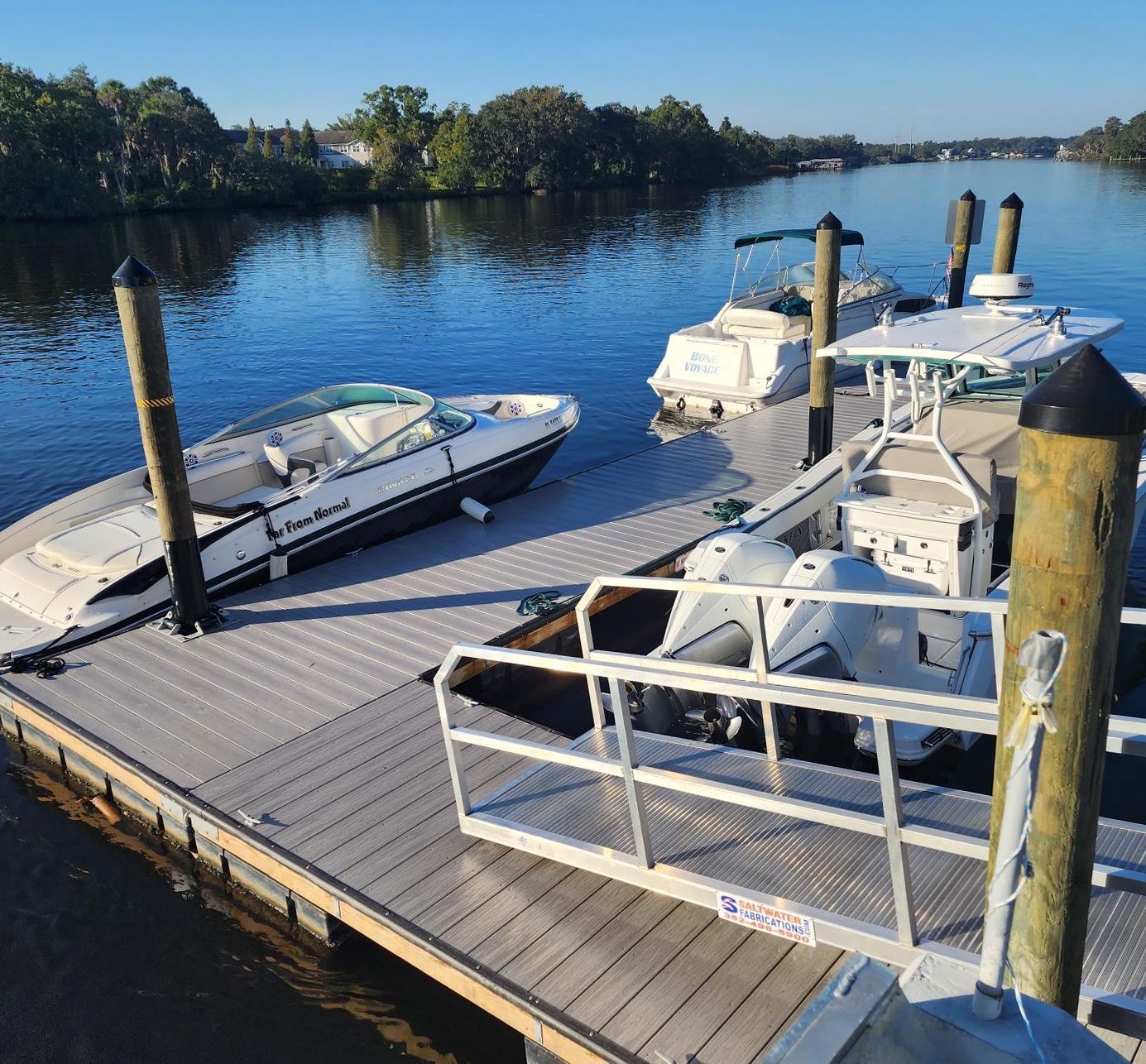 Several boats are docked at a dock at Riverview Marina