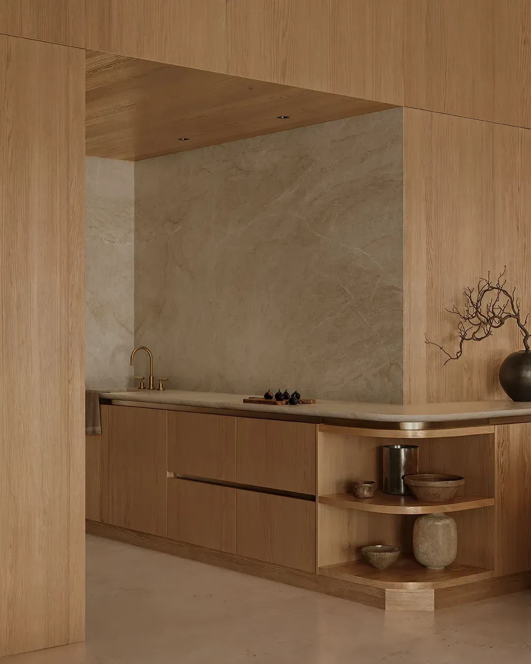 Wooden minimalist kitchen with beige walls, built-in cabinets, open shelves, and a stone countertop.