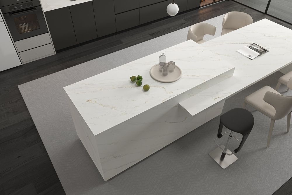Grid of assorted stone and tile samples in white, gray, beige, and marble patterns.