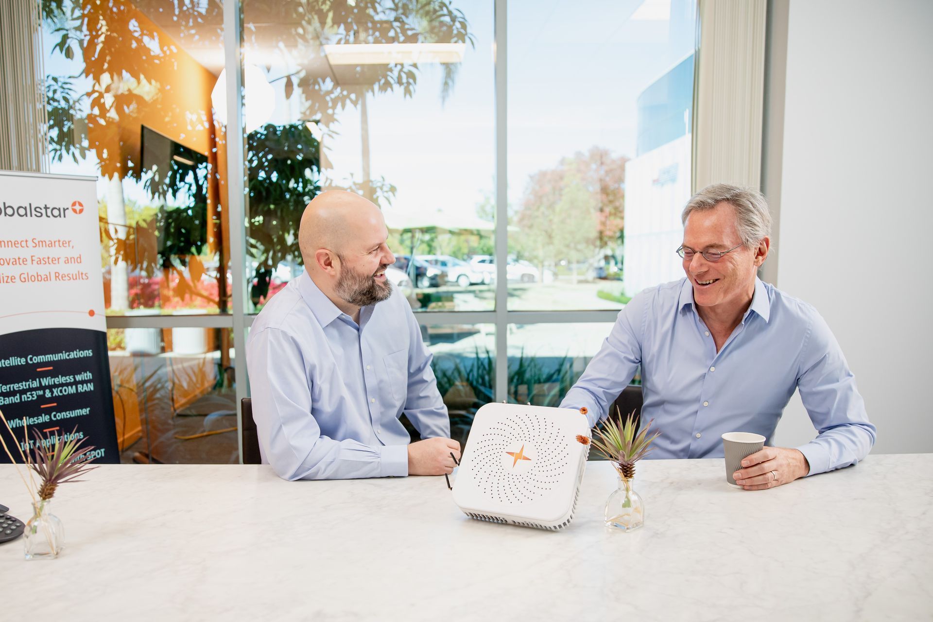 two men at conference table