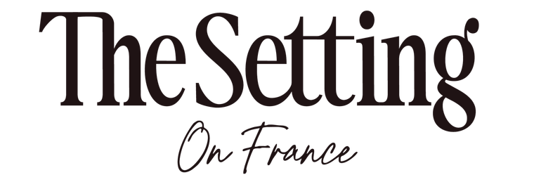 The Setting on France logo in beige and cursive text on a white background