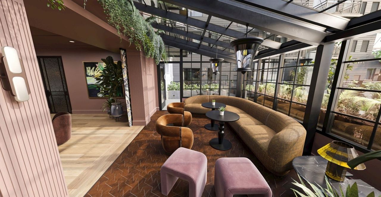 Lounge seating under the glass roof of the conservatory at The Setting on France