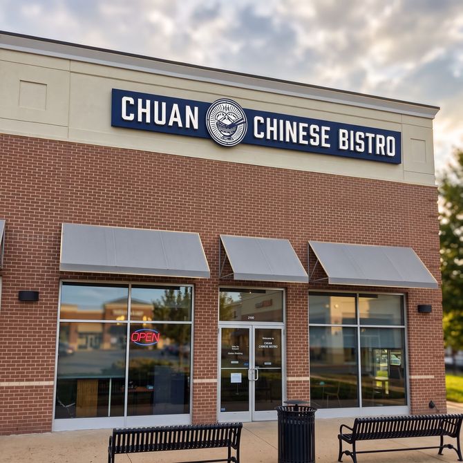Chuan Chinese Bistro storefront with brick facade, awnings, and outdoor benches
