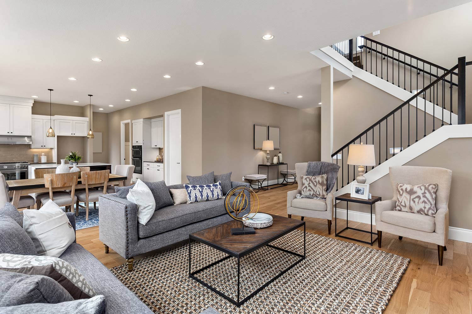 Modern Living Room — Gig Harbor, WA — Harbor Quality Painting, LLC Spacious open-concept living room with freshly painted neutral walls and modern décor.