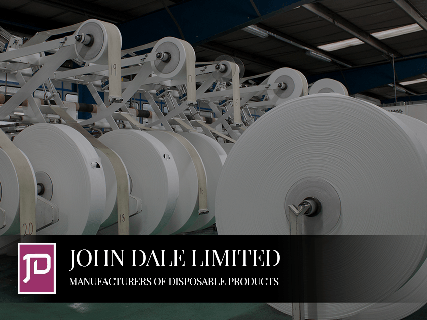 Large paper rolls on a production line at John Dale Limited, manufacturer of disposable products