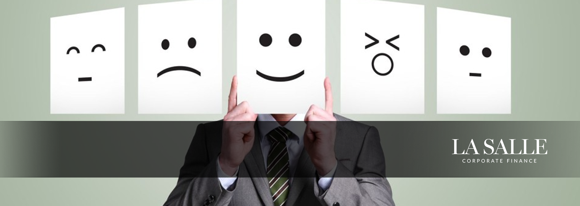 Five emotion icons over a person holding their face, with the word “LASSALE” on the right.