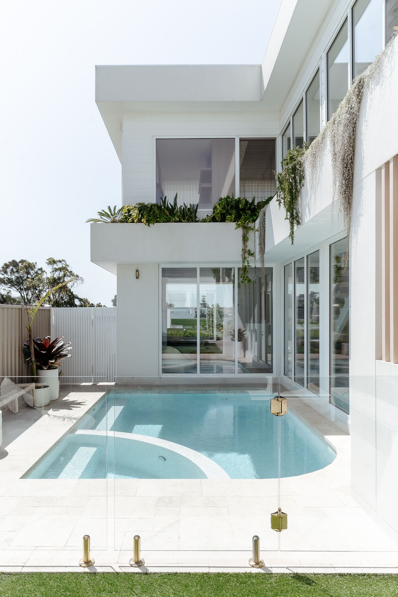 White modern house with a pool and greenery — SDC Building Design In Kiama, NSW
