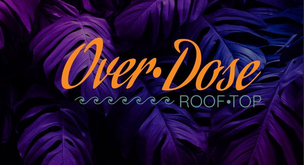 Over Dose rooftop logo in orange script over purple tropical leaves