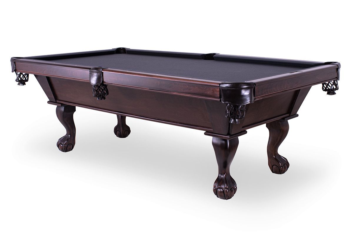 Dark wood billiard table with black felt and ornate carved legs