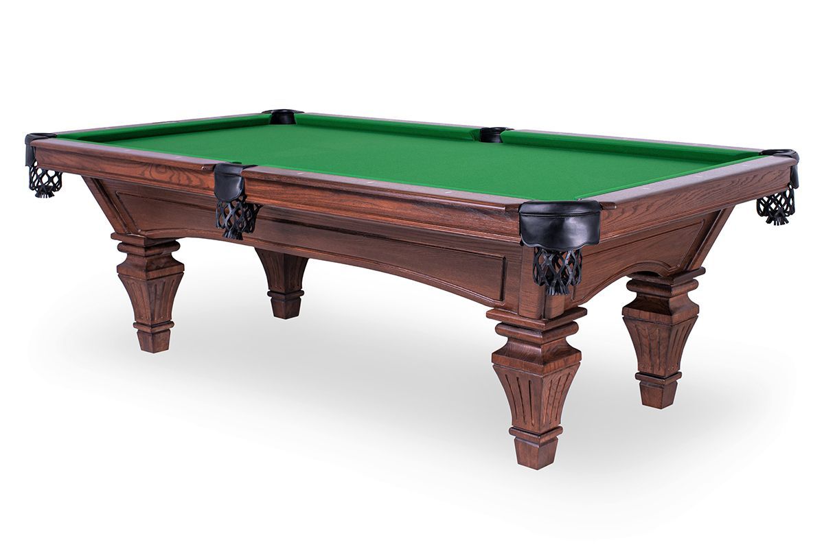 Wooden billiards table with green felt and carved legs on a white background