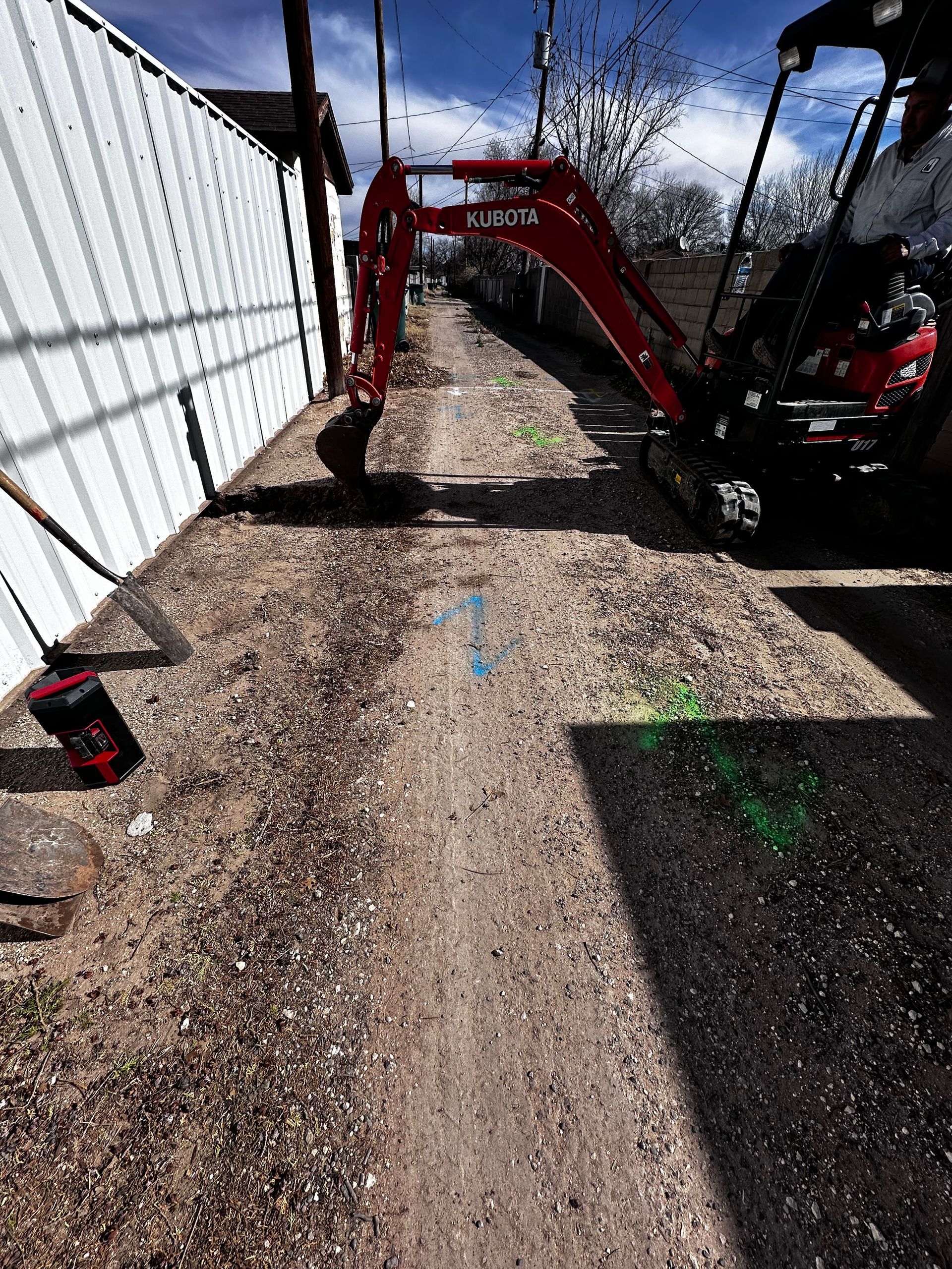 A red excavator with the word next on it
