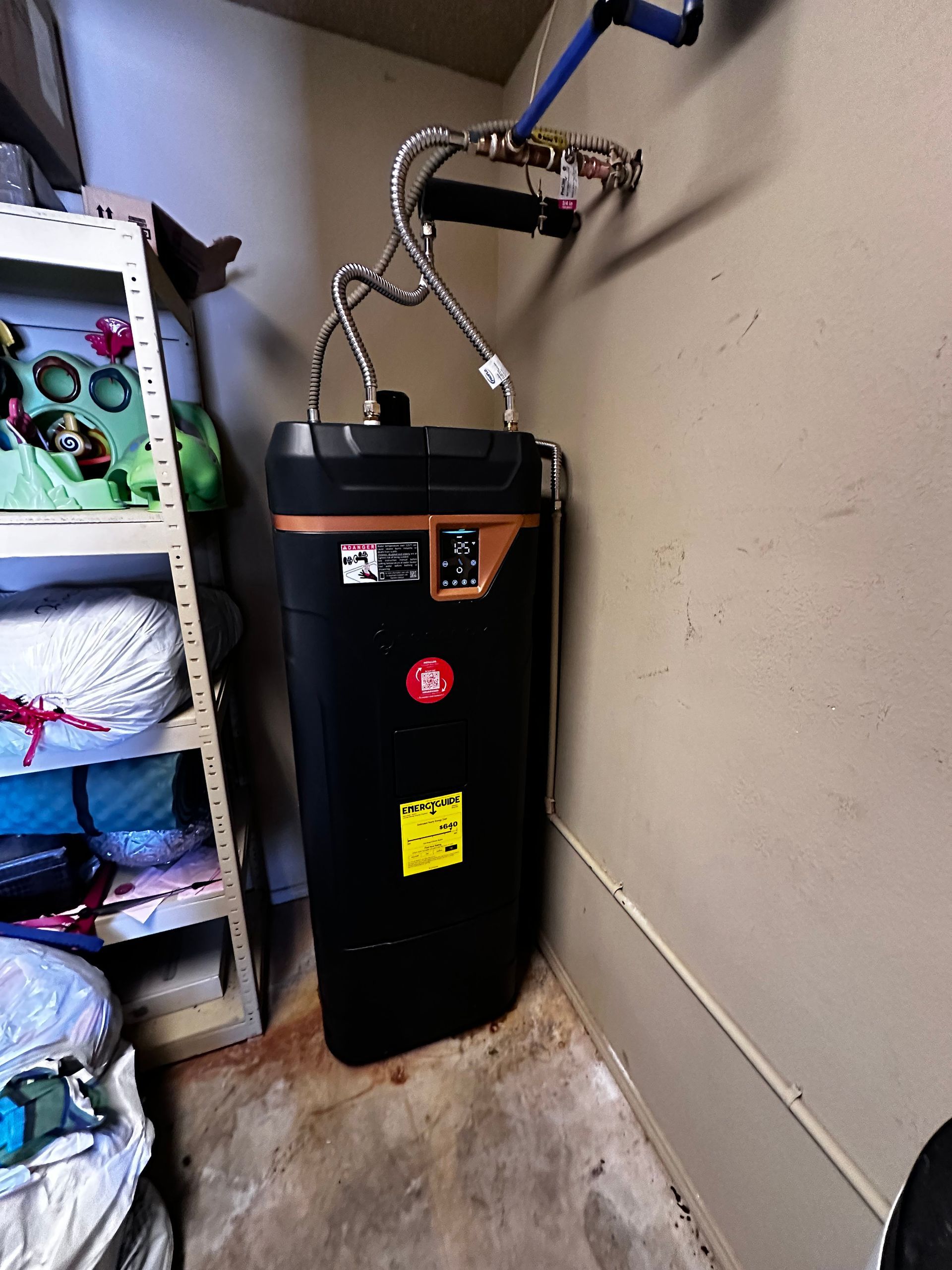 A black tank with a yellow sticker that says p on it