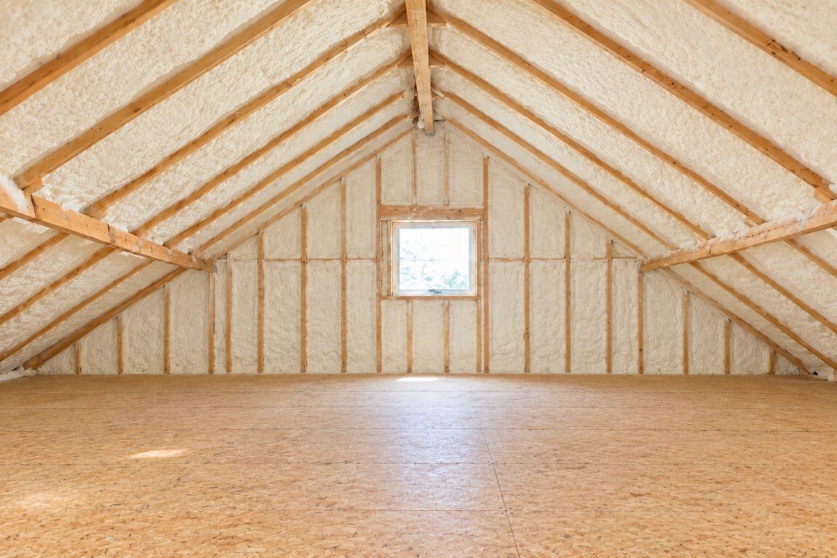 Attic with completed spray foam insulation in Mission TX