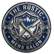 Logo for The Rustic Mens Salon, featuring a crossed axe and straight razor over a mountain forest shield in blue and gray.