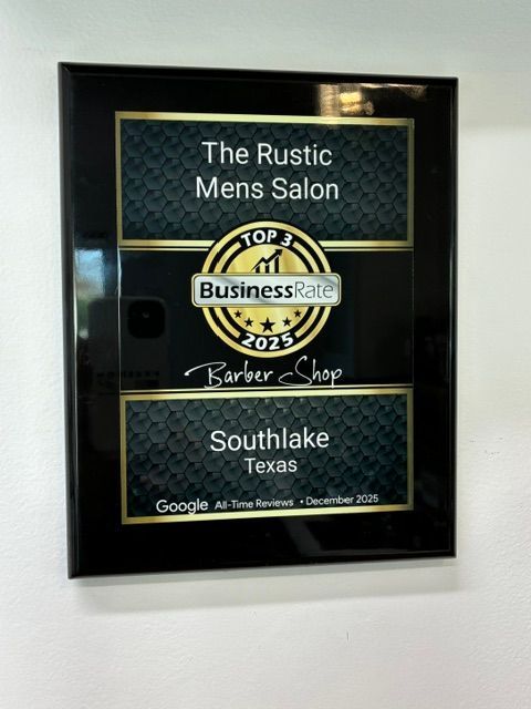 A black framed award plaque for The Rustic Mens Salon, a top-rated barber shop in Southlake, Texas, for 2025.