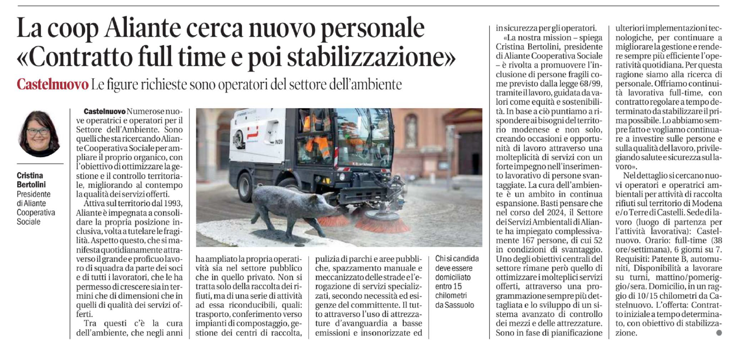 Articolo sulla cooperativa Aliante in cerca di nuovo personale. Spazzatrice stradale con una statua di lupo in primo piano.