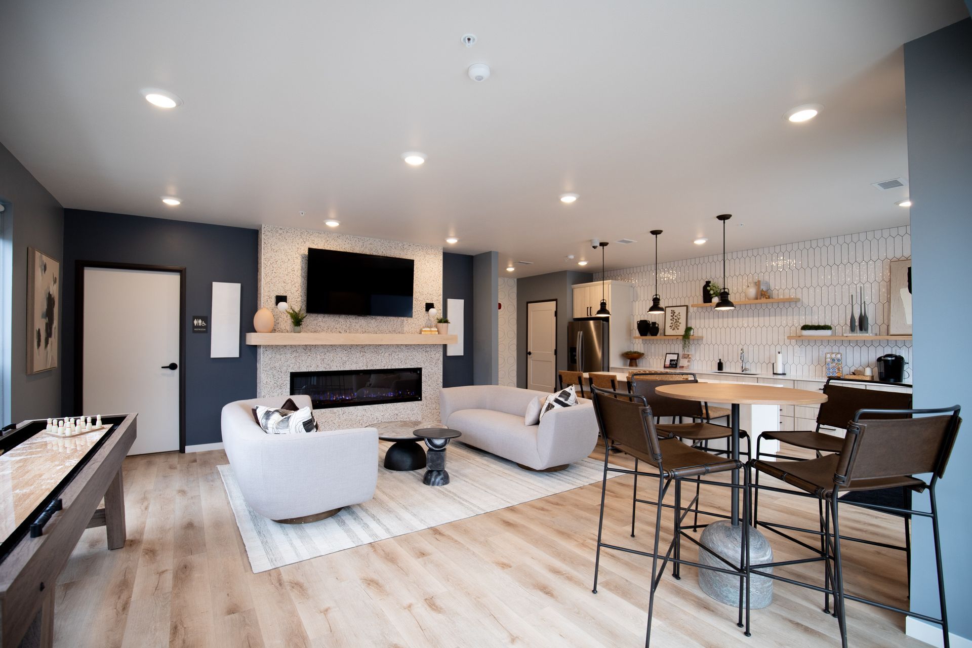 BLOC has a large community room and outdoor patio with a kitchen, shuffleboard