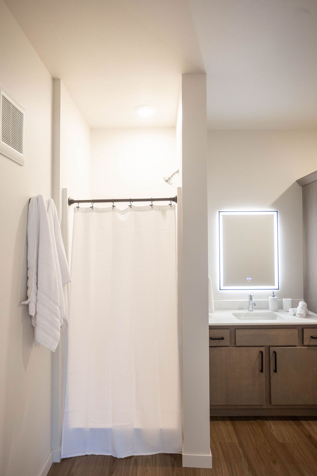 Large bathrooms with storage and defogging mirrors