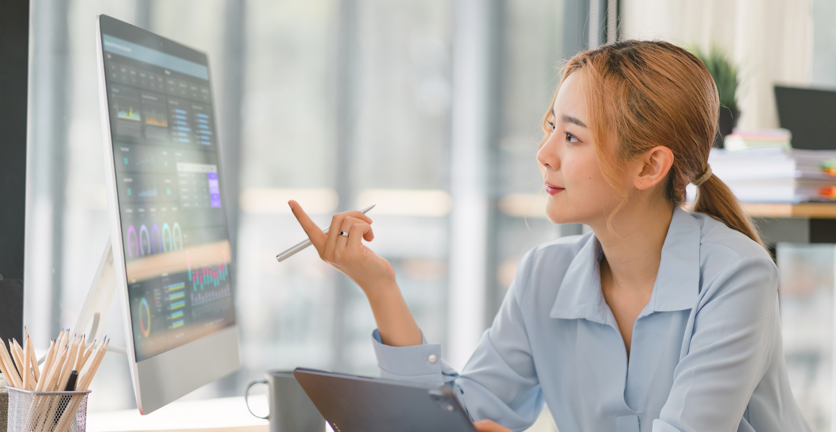 woman evaluating website performance metrics