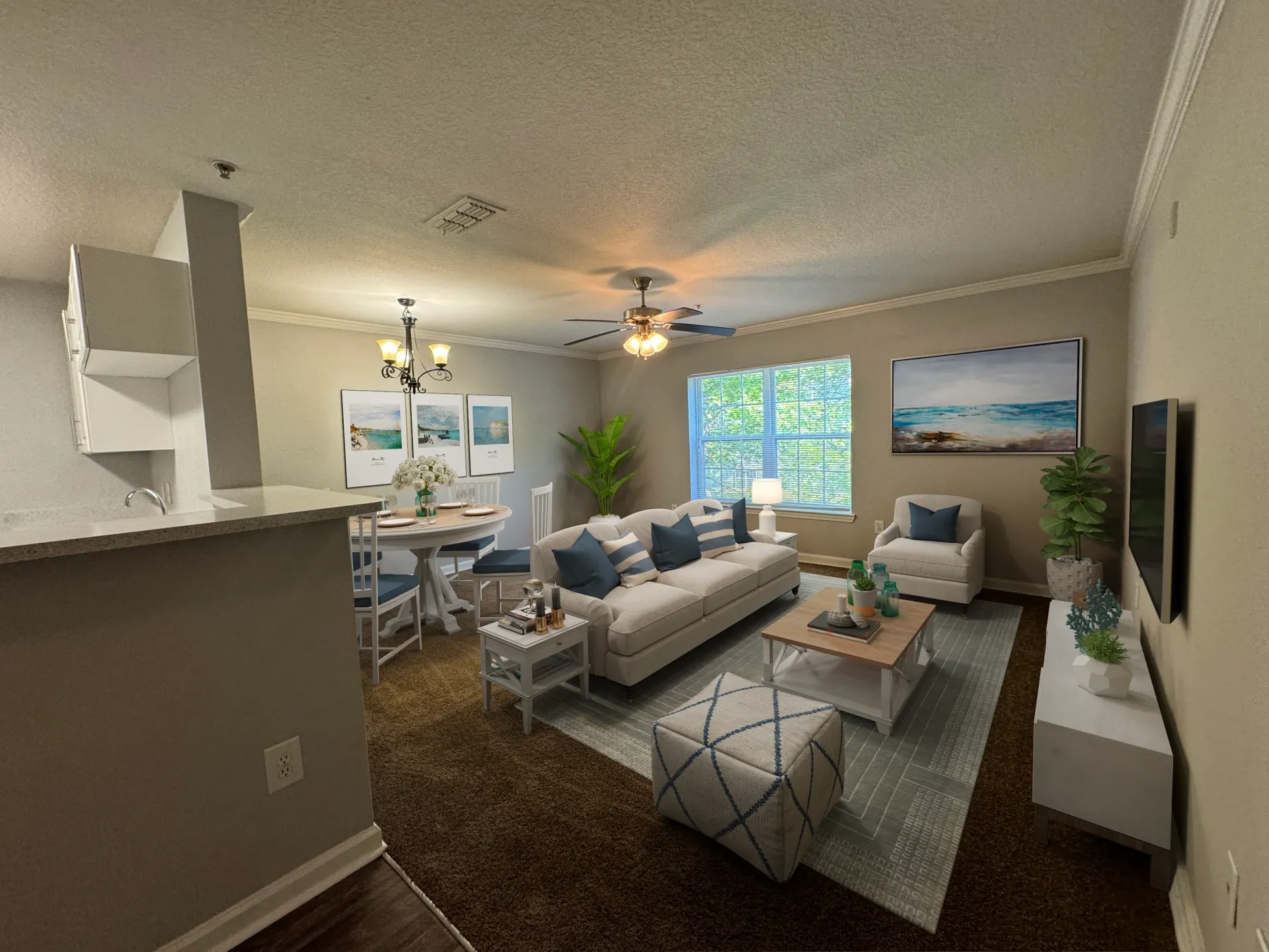 Living room and dining area with a sofa, chairs, dining table, and TV.