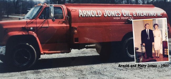 Red Arnold Jones Oil Service pickup truck with a small inset wedding photo on the side.