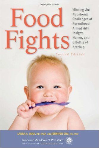 Book cover with baby biting a purple utensil, titled “Food Fights” in red and white text.