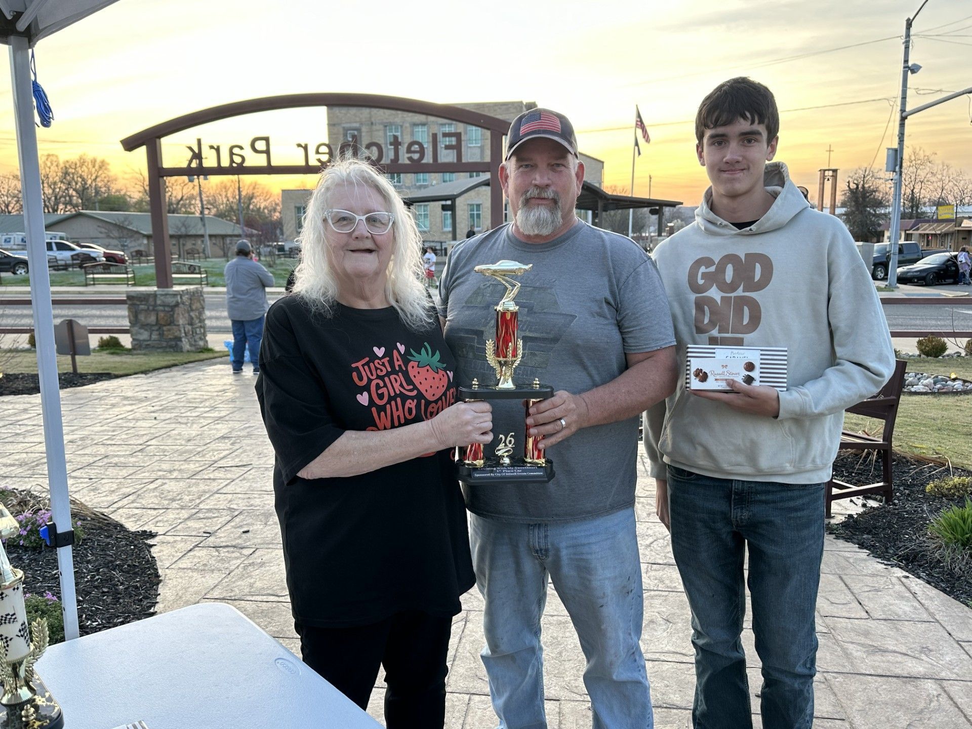 Mayor Jean Ann Wright awards a trophy to Darren Pendergraft