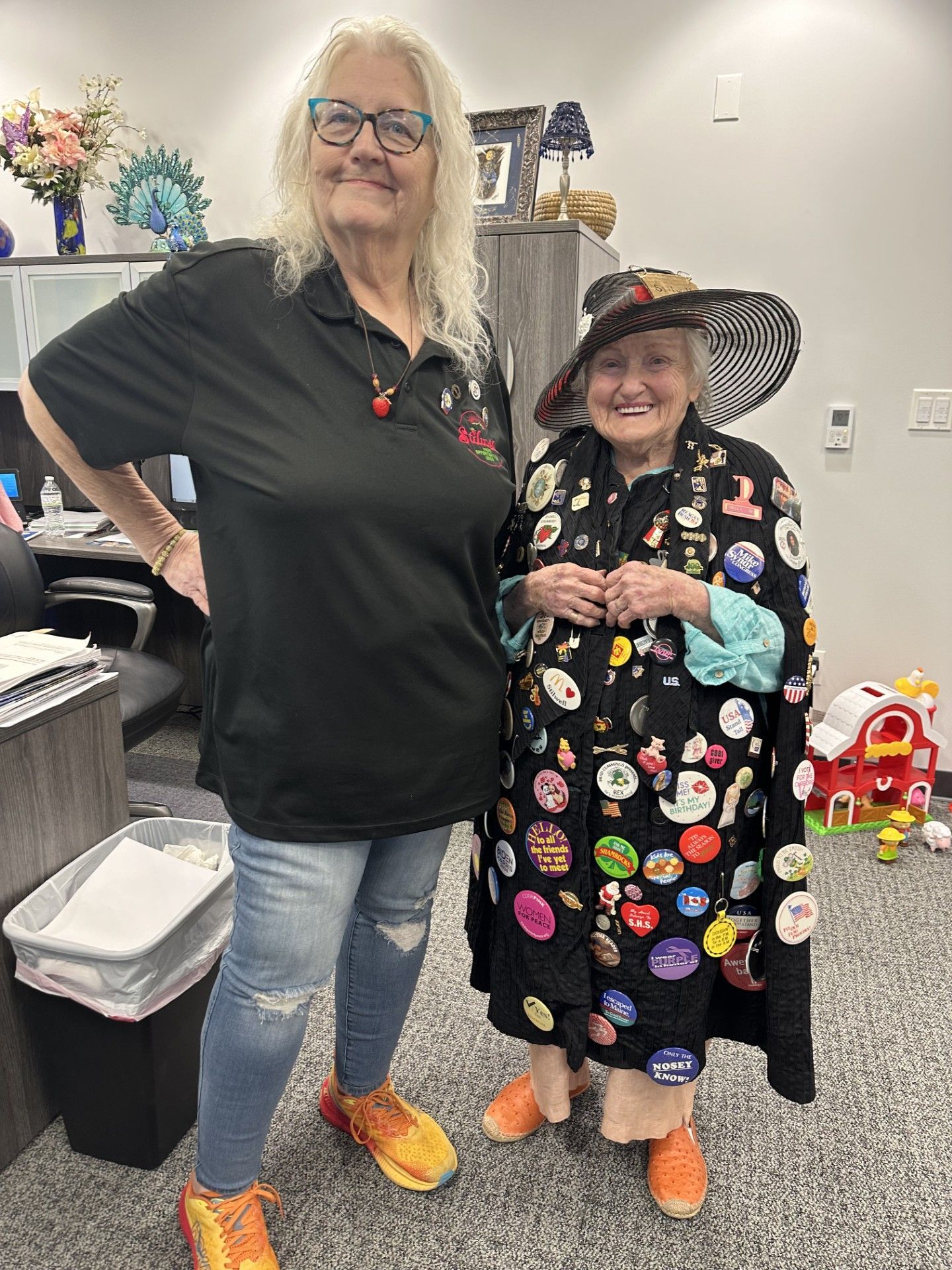 Mayor Wright and Dolly Dimple Schumann Kester are standing next to each other in the mayor's office.