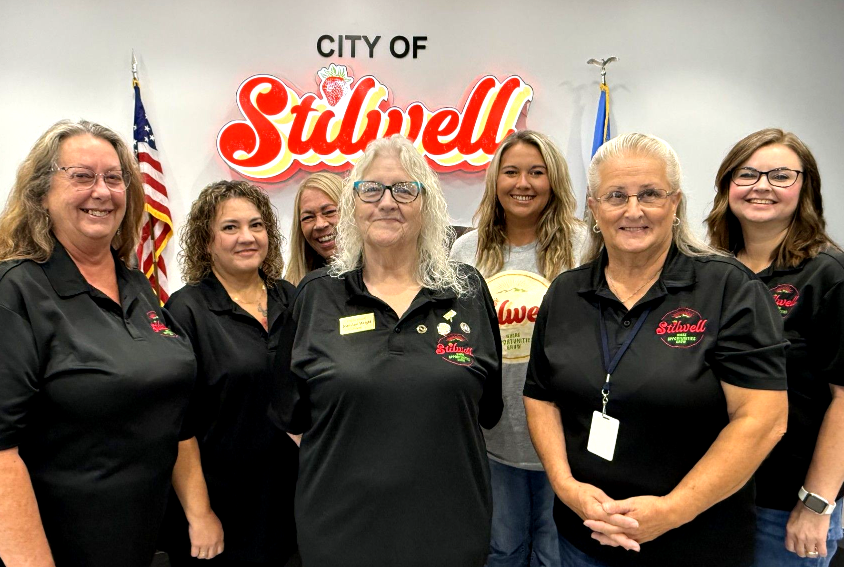 Ladies of City Hall, from left, are Denise Brown, Cindy Carson, Amy Duncan, Jean Ann Wright, Sheila Chronister and Renee Fite. standing in front of a sign that says city of Stilwell.