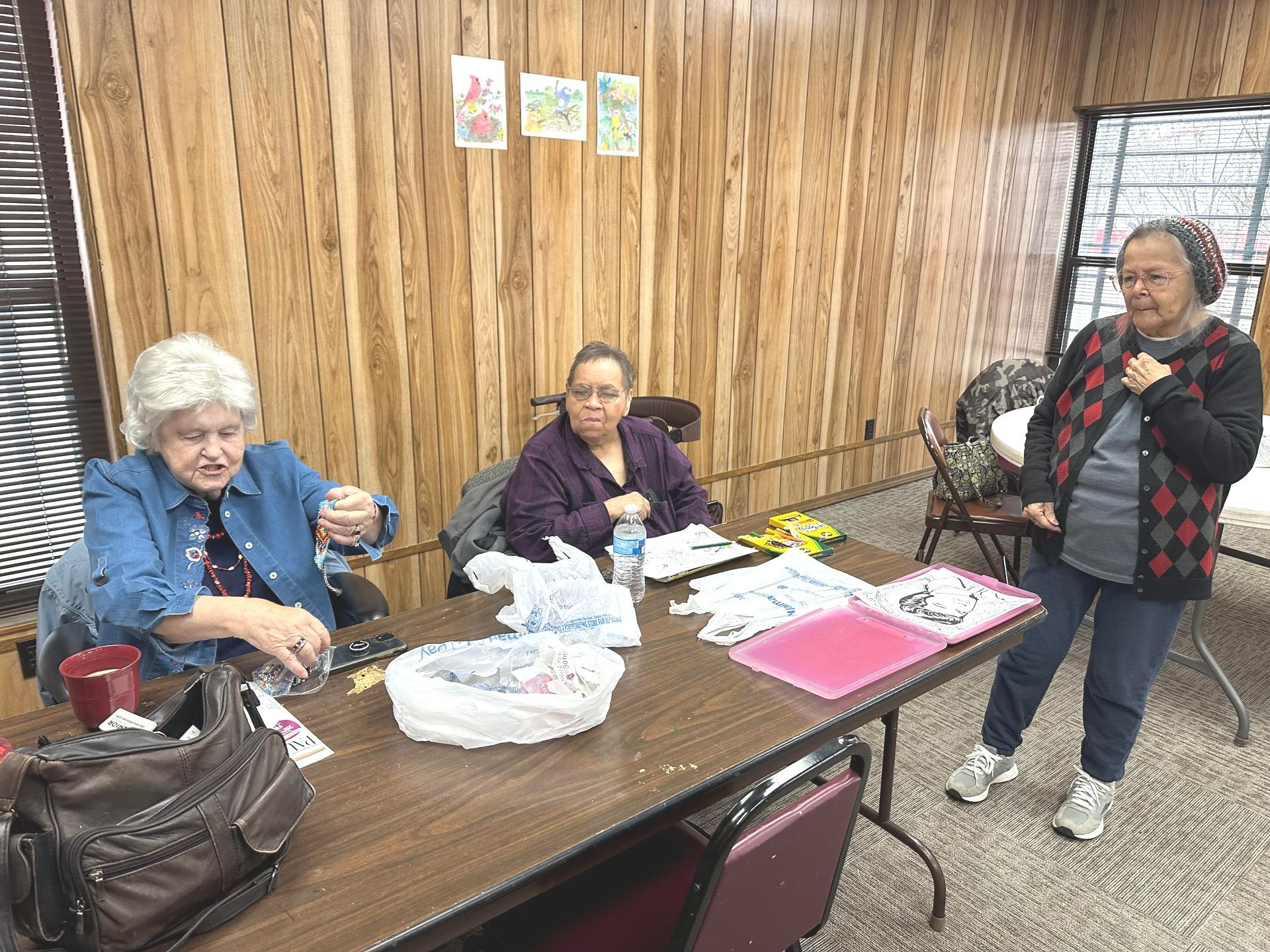 Women making art at the Community Building