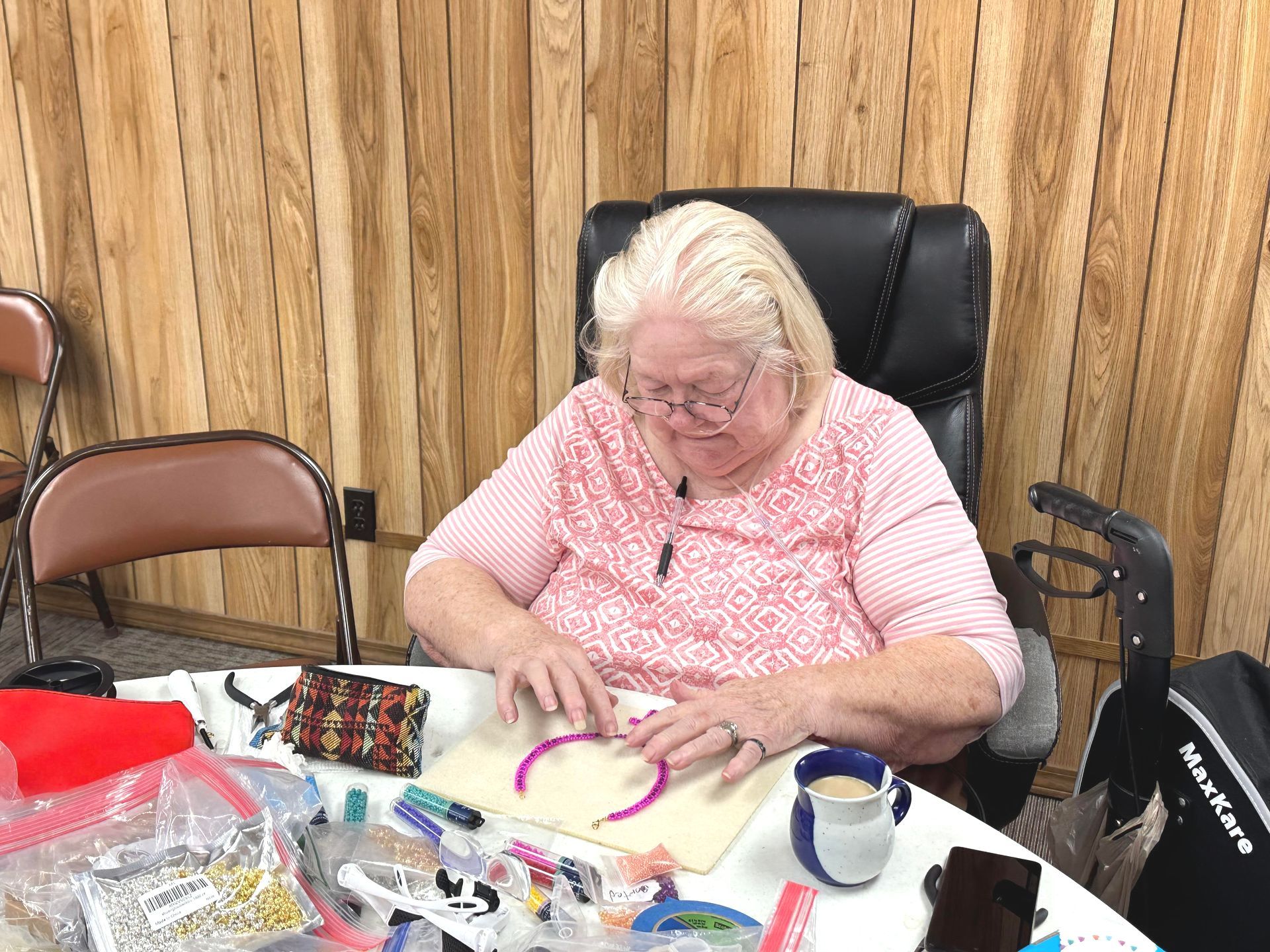 Lady doing crafts at the Community Building