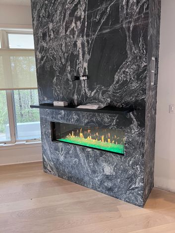 There is a fireplace in the middle of the room.