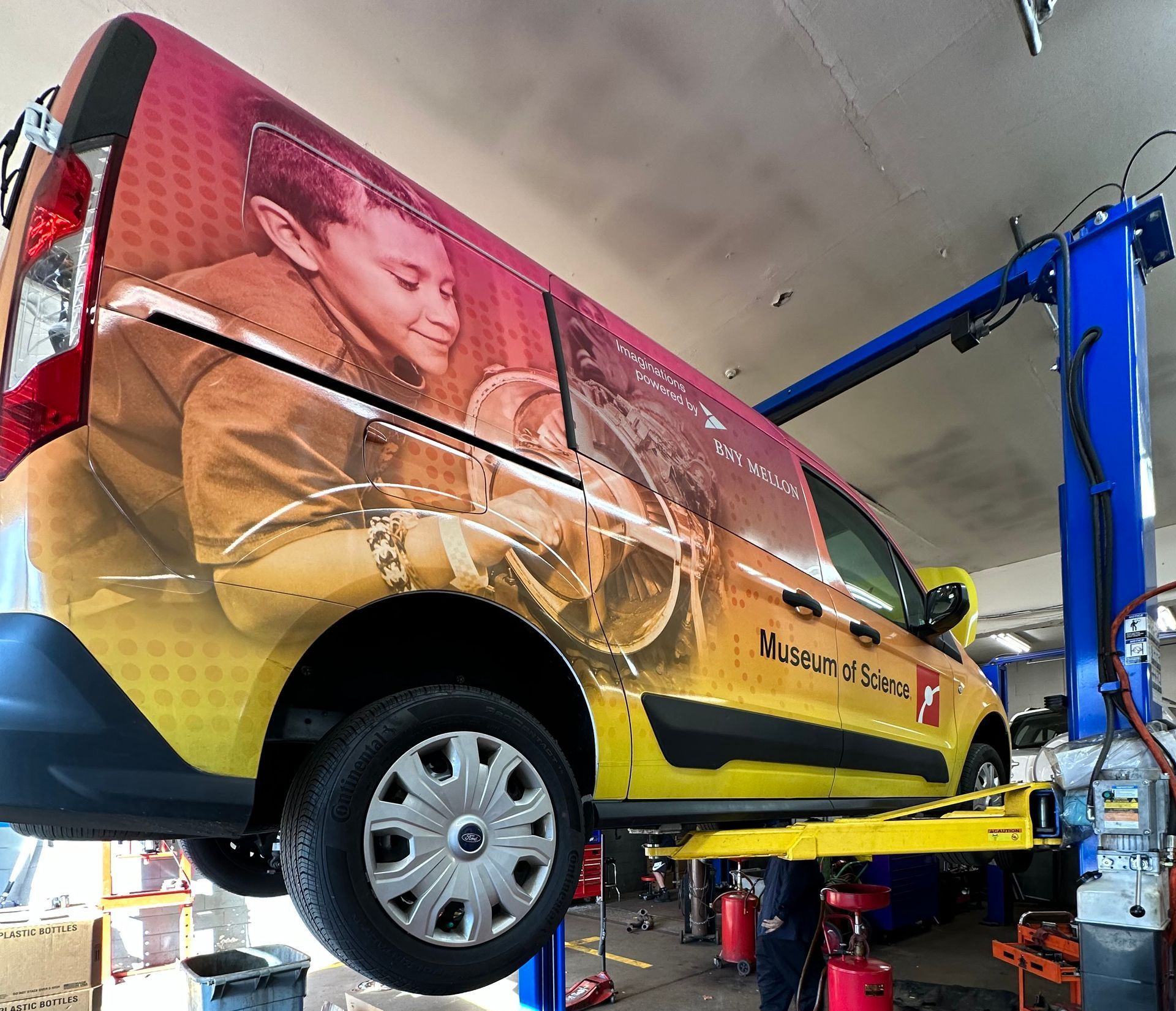 Fleet vehicle being repaired at Eli's Service Stationin Arlington, MA