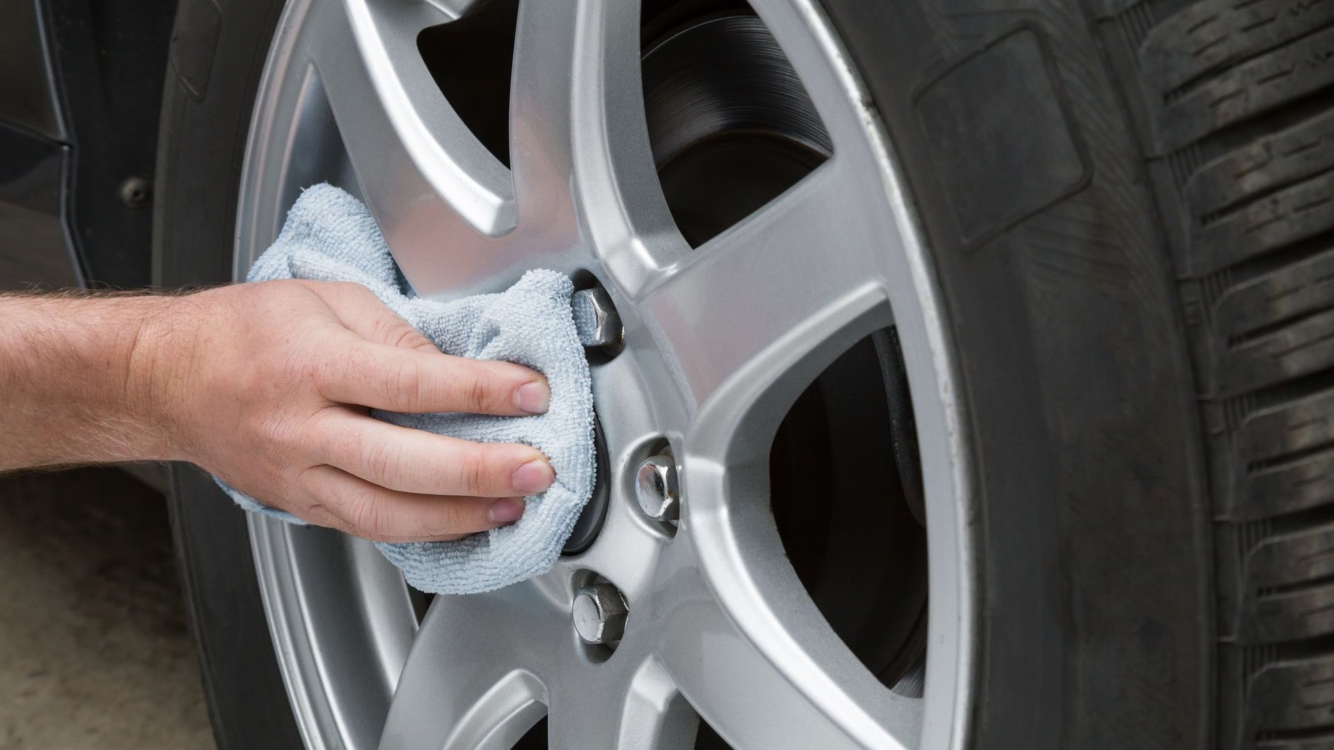 Spring Car Care tips in Arlington - Man washing car