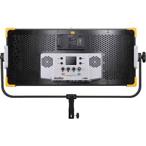 Front view of a black LED panel light with barn doors on a stand, showing the rear control panel
