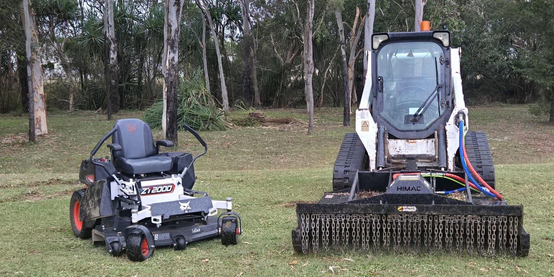 Two lawn mowers on grass — Old Mates Grass Cutters in Deeragun, QLD