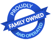 Blue circular badge reading “Proudly Family Owned and Operated” with a diagonal ribbon across it.