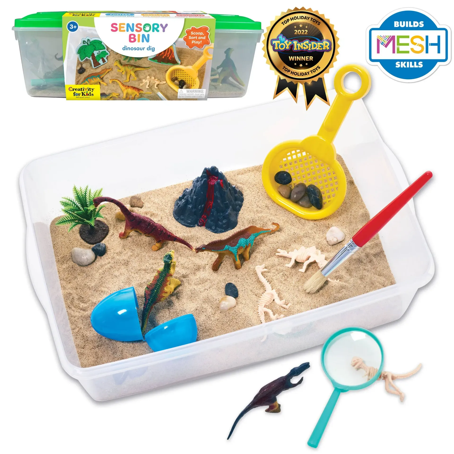Sand sensory bin with toy dinosaurs, scoops, magnifying glass, and tools in a clear tray