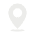 Light gray map pin icon with a circular center and shadow
