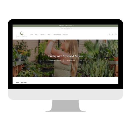 Website on a computer screen featuring jewelry and a person.