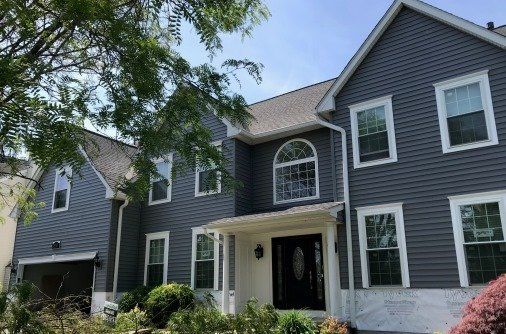 Replacement Siding Project With New Siding and Trim