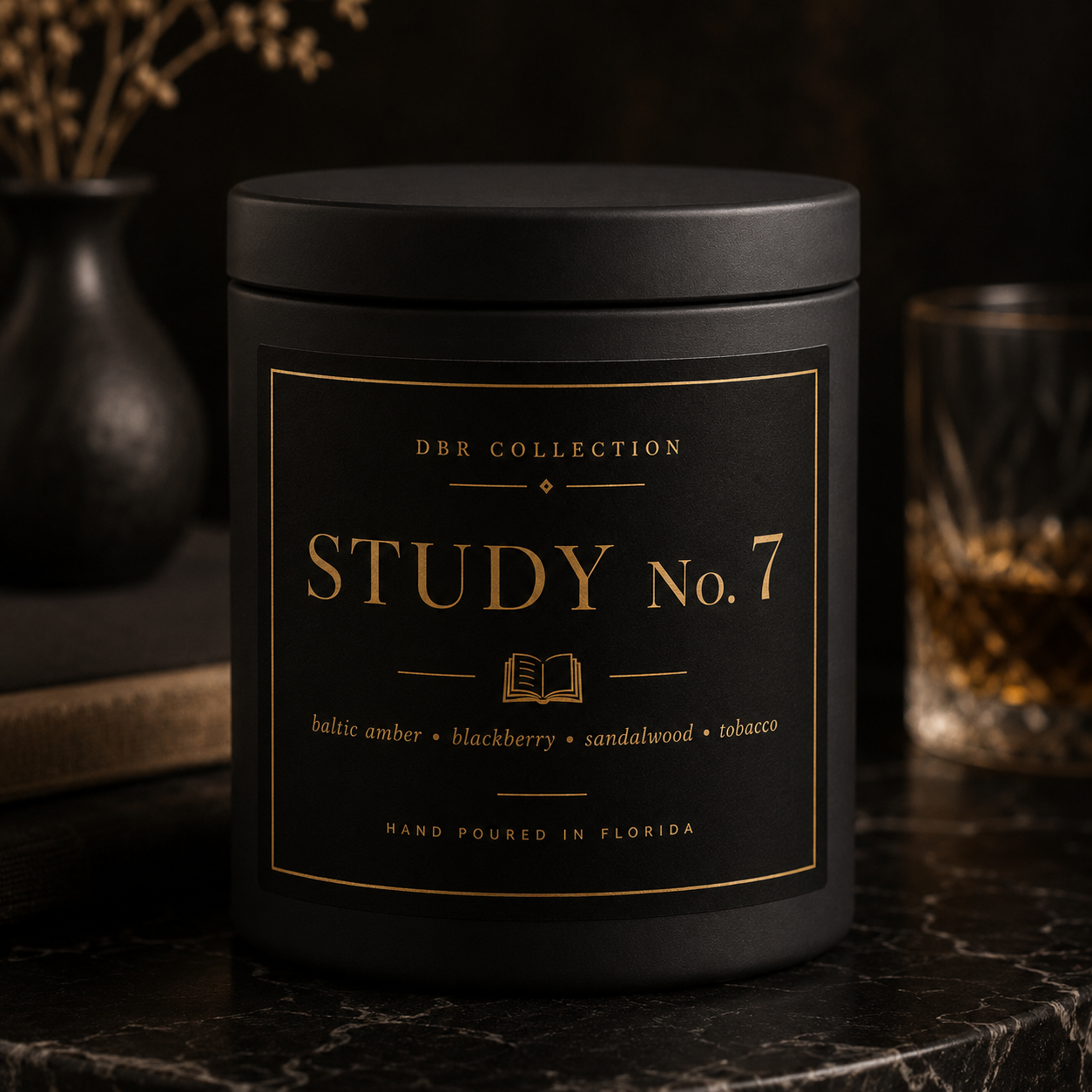 Black candle jar labeled “Study No. 7” on a dark marble surface with warm, moody lighting