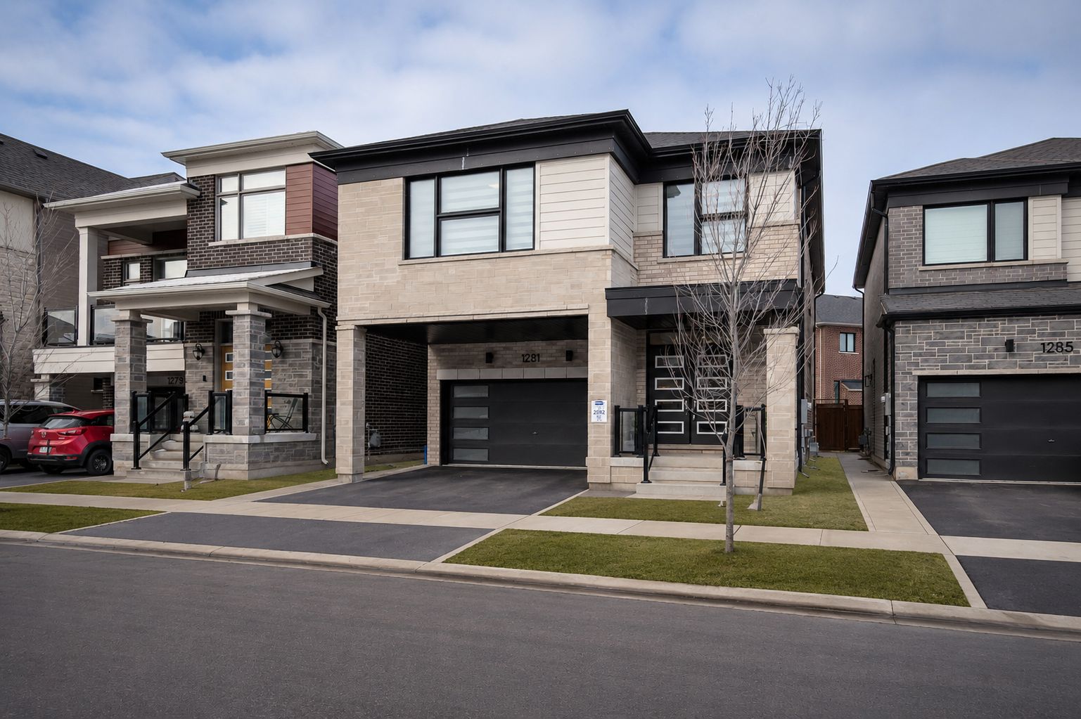 Recently built detached homes on a new street in the Bowes neighbourhood of Milton, Ontario
