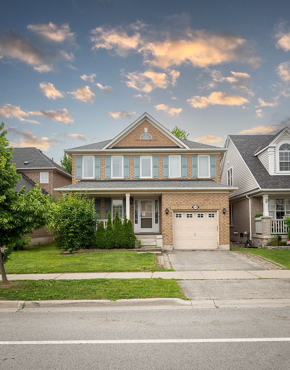Townhouses and single car garage detached homes in the Clarke neighbourhood of Milton, Ontario

