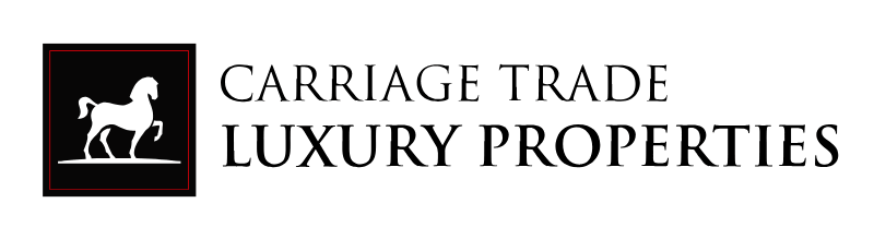 Carriage Trade Luxury Properties logo with white horse silhouette on black square.
